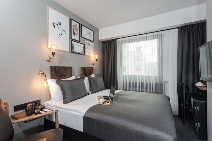 Imagen de la habitación del Hotel Cinnah. Foto 12