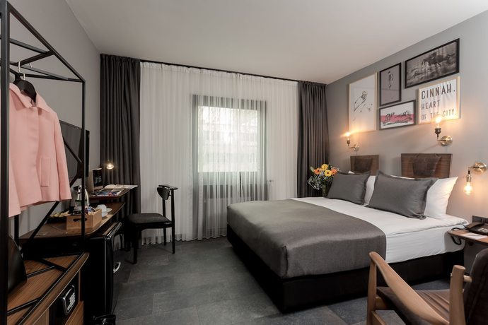 Imagen de la habitación del Hotel Cinnah. Foto 15