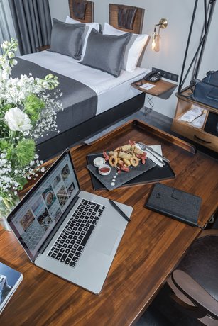 Imagen de la habitación del Hotel Cinnah. Foto 16