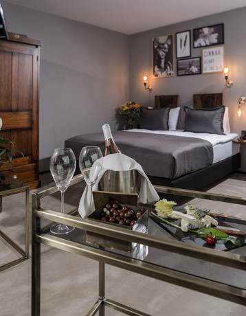 Imagen de la habitación del Hotel Cinnah. Foto 17