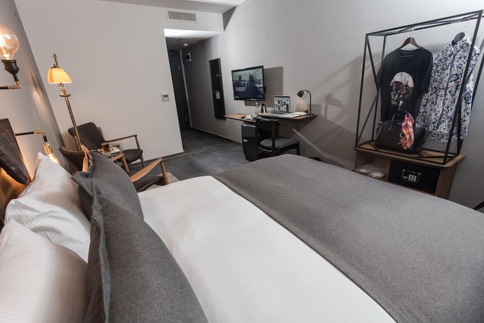 Imagen de la habitación del Hotel Cinnah. Foto 18