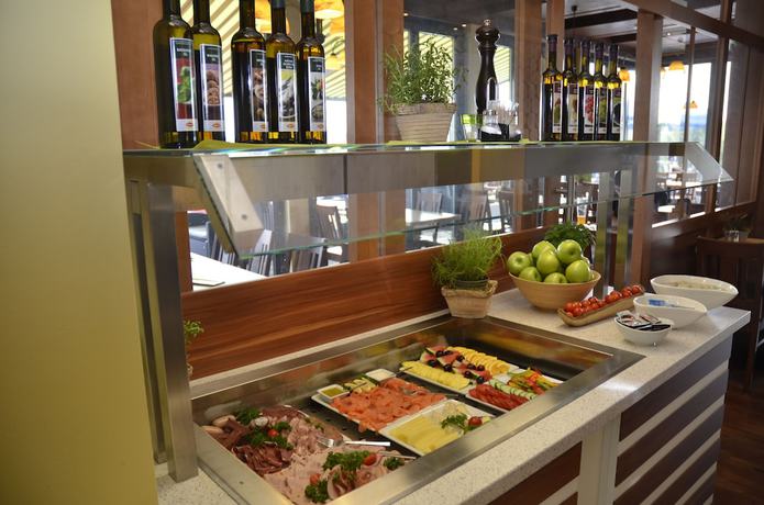 Imagen del bar/restaurante del Hotel Cloppenburg. Foto 10