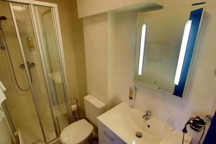 Imagen de la habitación del Hotel Cocco Bello Smart Check in. Foto 16