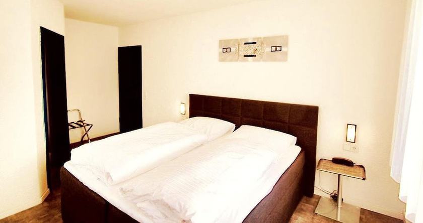 Imagen de la habitación del Hotel Cocco Bello Smart Check in. Foto 17