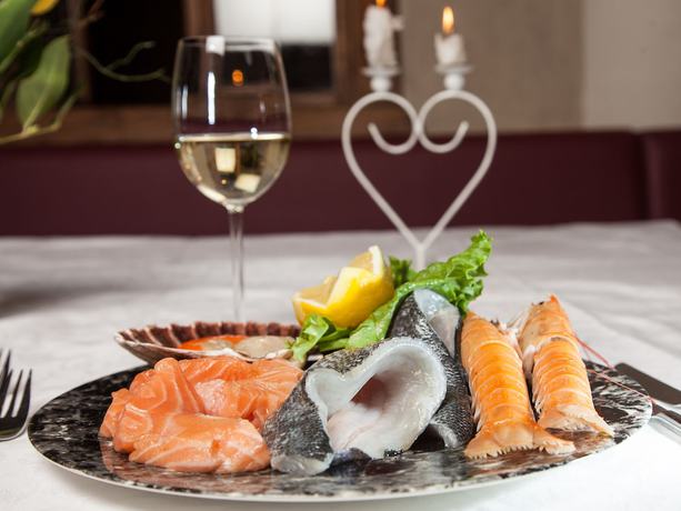 Imagen del bar/restaurante del Hotel Comfort Erica Dolomiti Val d\'Adige. Foto 2