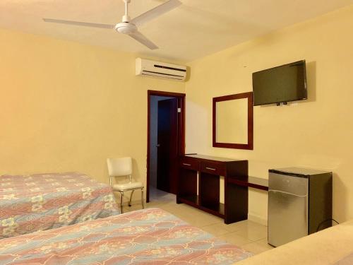 Imagen de la habitación del Hotel Cosmos. Foto 17