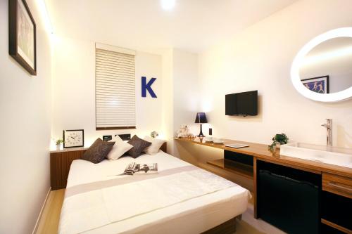 Imagen de la habitación del Hotel DUO. Foto 8