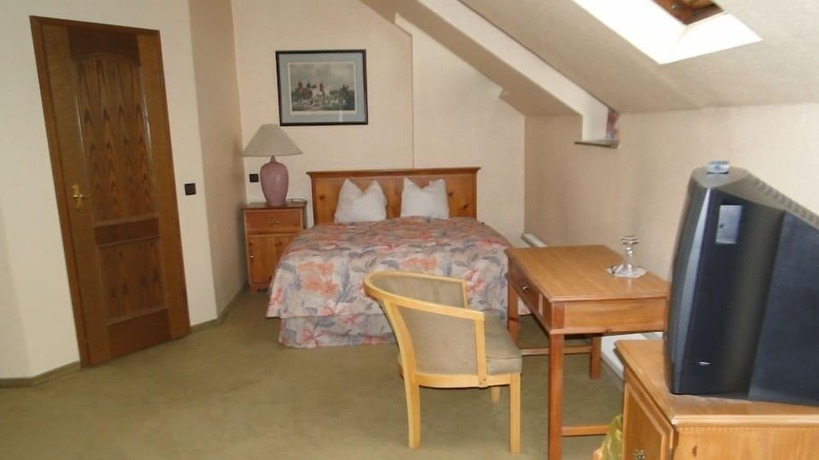 Imagen de la habitación del Hotel Dallgow. Foto 12