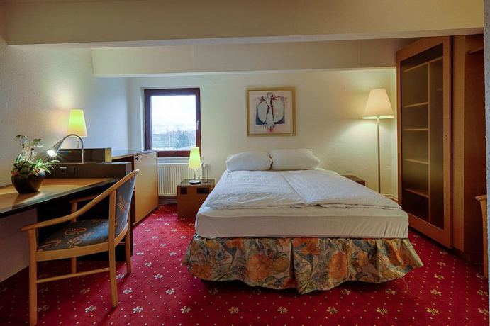Imagen de la habitación del Hotel Dallgow. Foto 14