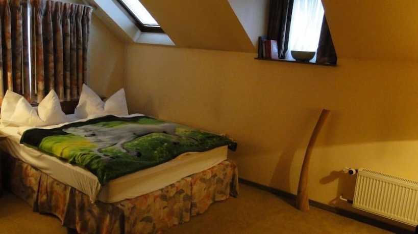 Imagen de la habitación del Hotel Dallgow. Foto 15