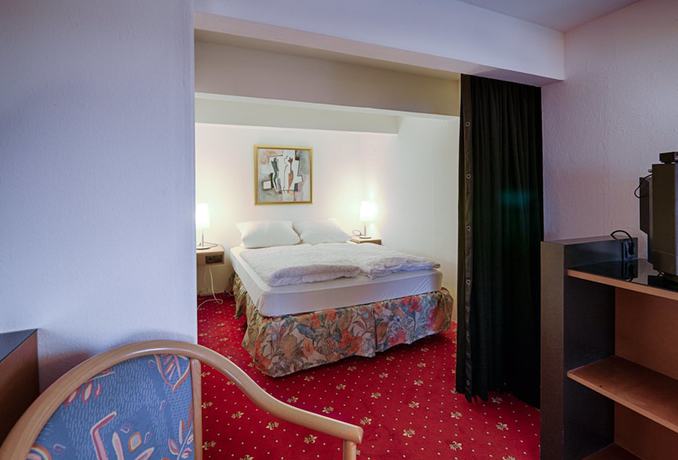 Imagen de la habitación del Hotel Dallgow. Foto 17