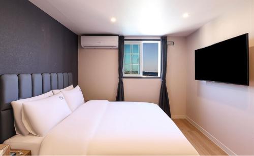 Imagen de la habitación del Hotel Daon. Foto 11