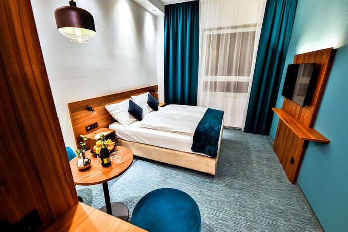 Imagen de la habitación del Hotel Das Zeit. Foto 15