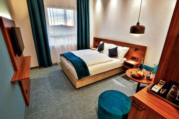 Imagen de la habitación del Hotel Das Zeit. Foto 16