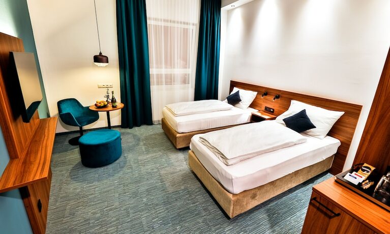 Imagen de la habitación del Hotel Das Zeit. Foto 17