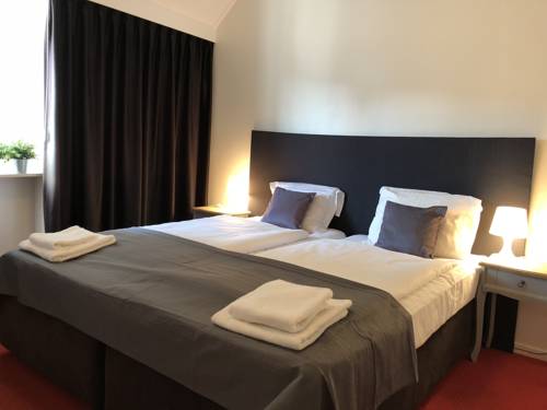 Imagen de la habitación del Hotel De Kroon. Foto 4