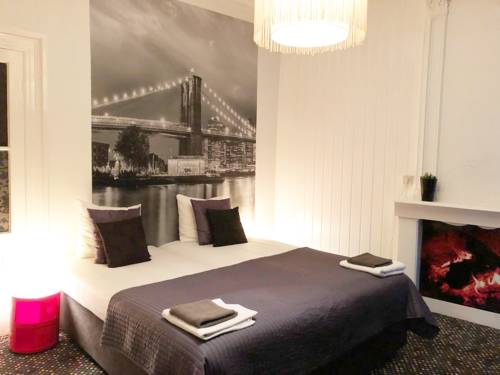 Imagen de la habitación del Hotel De Kroon. Foto 10