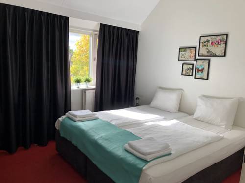 Imagen de la habitación del Hotel De Kroon. Foto 11