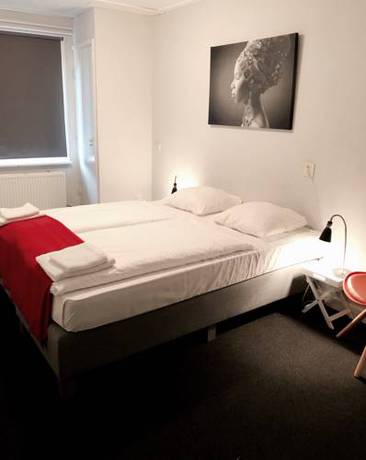 Imagen de la habitación del Hotel De Kroon. Foto 13