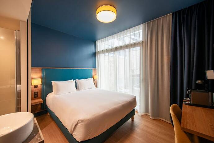 Imagen de la habitación del Hotel De La Cité. Foto 14