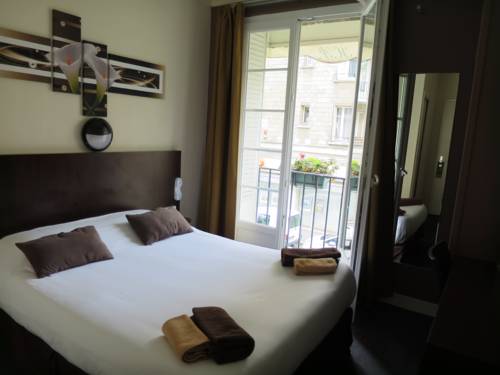 Imagen de la habitación del Hotel De La Paix, Caen. Foto 9