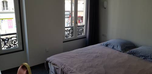 Imagen de la habitación del Hotel De La Paix, Par&iacute;s. Foto 5