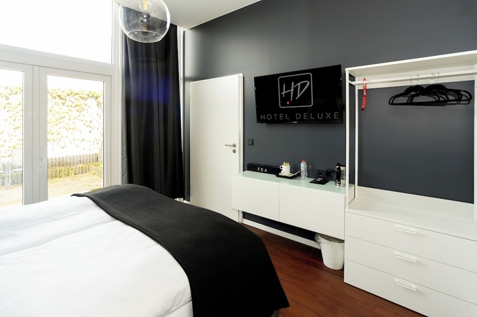 Imagen de la habitación del Hotel Deluxe. Foto 2