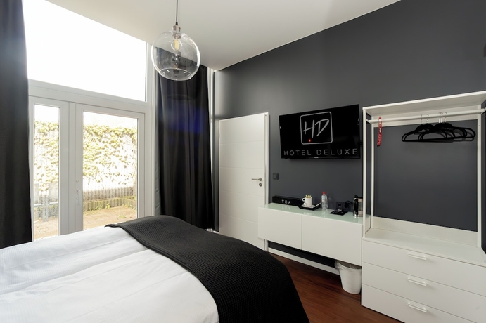 Imagen de la habitación del Hotel Deluxe. Foto 5