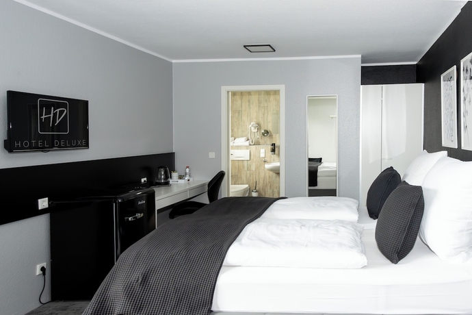 Imagen de la habitación del Hotel Deluxe. Foto 8
