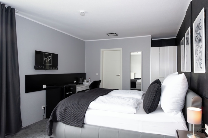 Imagen de la habitación del Hotel Deluxe. Foto 12