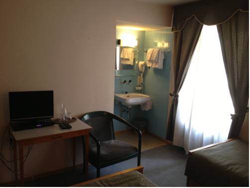 Imagen de la habitación del Hotel Des Alpes. Foto 16