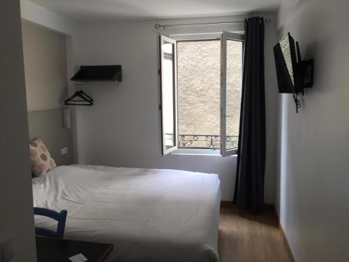 Imagen de la habitación del Hotel Des Arcades, Reims. Foto 9
