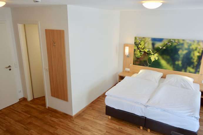 Imagen de la habitación del Hotel Deutsches Haus, Kitzingen. Foto 9