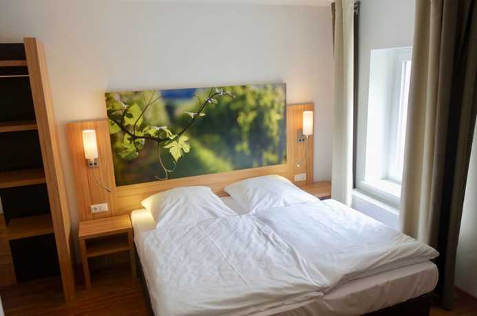 Imagen de la habitación del Hotel Deutsches Haus, Kitzingen. Foto 15