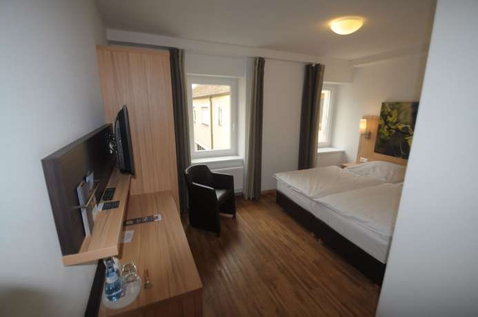 Imagen de la habitación del Hotel Deutsches Haus, Kitzingen. Foto 16