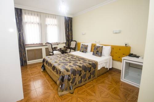 Imagen de la habitación del Hotel Devman. Foto 5