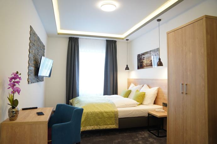Imagen de la habitación del Hotel Dias. Foto 7