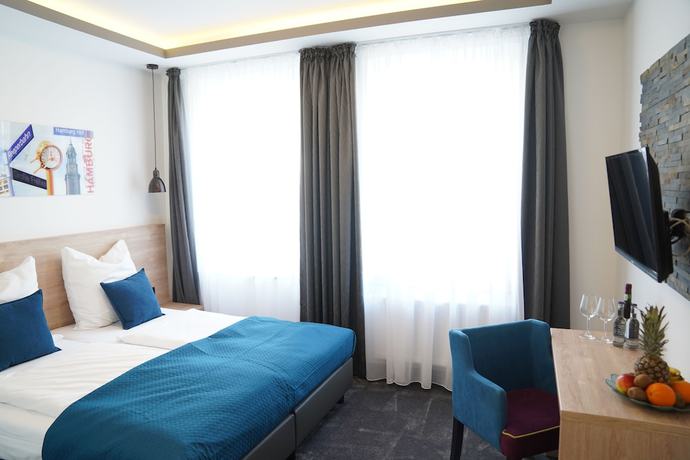 Imagen de la habitación del Hotel Dias. Foto 11