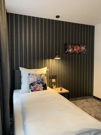 Imagen de la habitación del Hotel Dias. Foto 18