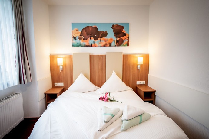 Imagen de la habitación del Hotel DomBlick, Colonia. Foto 10