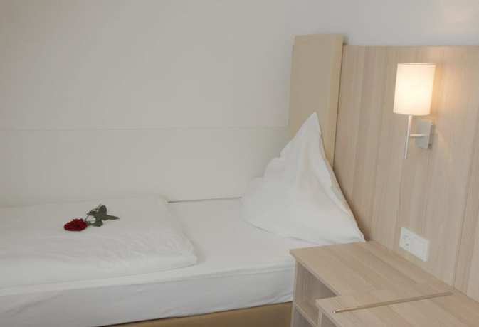 Imagen de la habitación del Hotel DomBlick, Colonia. Foto 14
