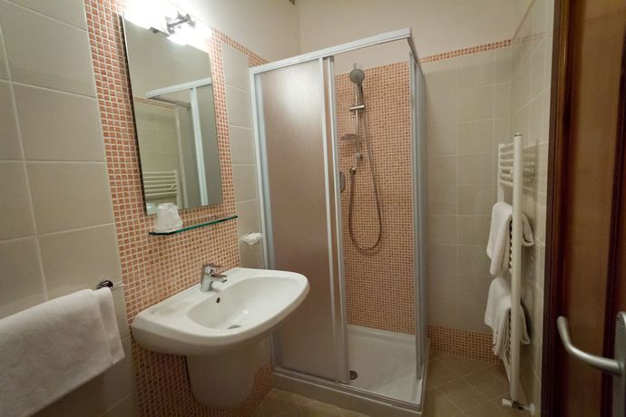 Imagen de la habitación del Hotel Donnini. Foto 11