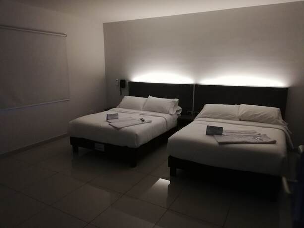 Imagen de la habitación del Hotel Doral Inn. Foto 3
