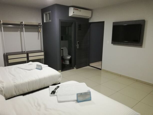 Imagen de la habitación del Hotel Doral Inn. Foto 6