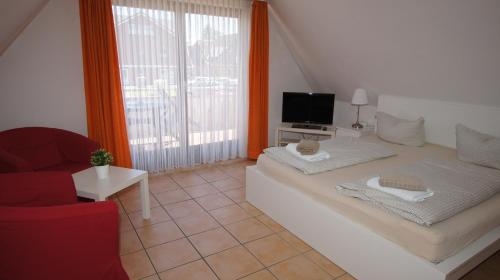 Imagen de la habitación del Hotel Dorfkrug B&uuml;sum. Foto 8