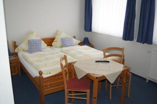 Imagen de la habitación del Hotel Dorfkrug B&uuml;sum. Foto 10