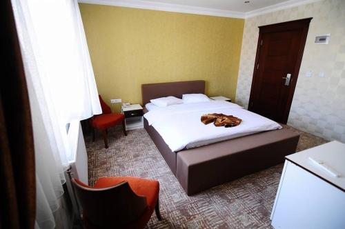 Imagen de la habitación del Hotel Dosco. Foto 8