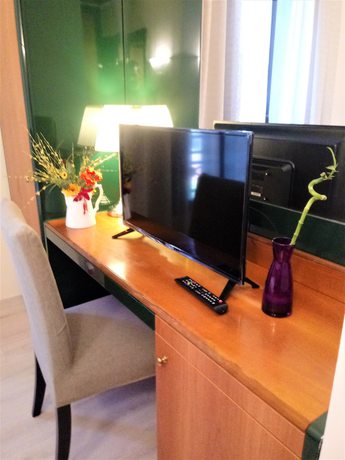 Imagen de la habitación del Hotel Dozza. Foto 11