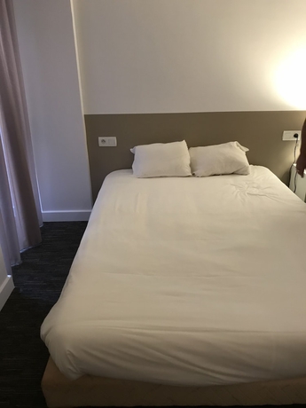Imagen de la habitación del Hotel Du Clocher. Foto 11