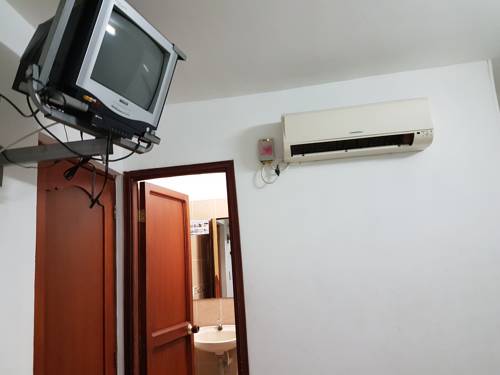 Imagen de la habitación del Hotel El Reposo Suite. Foto 4